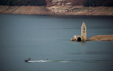 The remains of the church of Sant Roma de Sau emerge from the low waters of the Sau Reservoir, north of Barcelona, Spain, August 8, 2022. (Reuters)