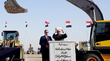 A handout image released by the press office of Iraqi Prime Minister on its Facebook page on August 10, 2022 shows Prime Minister Mustafa al-Kadhemi (R) during the laying of the foundation stone ceremony of the Mosul International Airport rehabilitation project. (AFP)