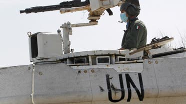 A UN peacekeeper (UNIFIL) sits in an armored vehicle in Naqoura, near the Lebanese-Israeli border. (File Photo: Reuters)