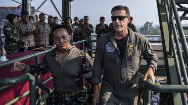 Commander of the US Indo-Pacific Command Admiral John Aquilino (R) walks with Indonesian Armed Forces Chief General Andika Perkasa during the Super Garuda Shield 2022 joint military exercises in Baturaja, South Sumatra on August 12, 2022. (AFP)