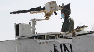 A UN peacekeeper (UNIFIL) sits in an armored vehicle in Naqoura, near the Lebanese-Israeli border. (File Photo: Reuters)