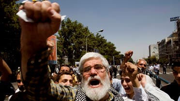 Iranian worshippers shout anti-Britain and anti-Salman Rushdie slogans after Friday prayers in Tehran on June 22, 2007. (Reuters)