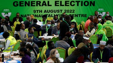 Political parties’ delegates and officials from the Independent Electoral and Boundaries Commission (IEBC) are seen the floor of the IEBC National tallying center at the Bomas of Kenya, in Nairobi, Kenya, on August 14, 2022. (Reuters)