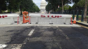 Charred pavement is left behind in an area where a man crashed his car into a barricade near the U.S. Capitol and fired shots into the air before killing himself, in Washington, US August 14, 2022. (Reuters)