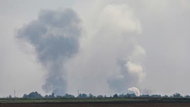 A view shows smoke rising above the area following an alleged explosion in the village of Mayskoye in the Dzhankoi district, Crimea, on August 16, 2022. (Reuters)