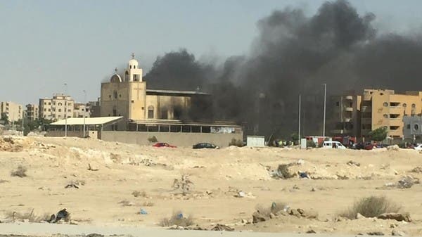 The cameras unveiled them .. Two young children played with candles and burned the church of El Mina