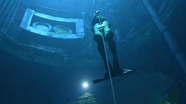 Free diver Alexey Molchanov swimming back up after free diving to the bottom of world’s deepest pool , deep Dive Dubai, in 57 seconds. (WAM)