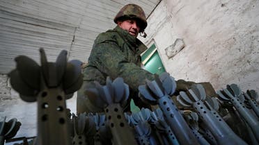 A service member of pro-Russian troops in uniform without insignia is seen at the weapons depot during Ukraine-Russia conflict near Marinka, in the Donetsk Region, Ukraine March 22, 2022. (File photo: Reuters)