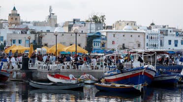 People sit at the old port of Bizerte, ahead of Sunday's presidential election, Tunisia, September 12, 2019. (File photo: Reuters)