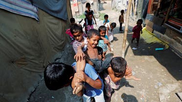 Children from the Rohingya community play outside their shacks in a camp in New Delhi, India October 4, 2018. (File photo: Reuters)