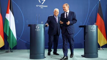 German Chancellor Olaf Scholz and Palestinian President Mahmoud Abbas attend a news conference, in Berlin, Germany, on August 16, 2022. (Reuters)