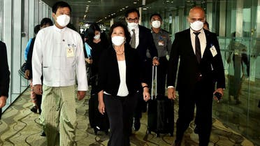 This handout photograph taken and released on August 16, 2022 by Myanmar’s military information team shows UN Special Envoy on Myanmar Noeleen Heyzer (C) walking with high-level officials following her arrival at the airport in Yangon. (AFP)