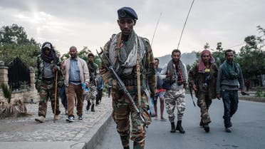 Tigray People's Liberation Front (TPLF) fighters arrive after eight hours of walking in Mekele, the capital of Tigray region, Ethiopia, on June 29, 2021. (AFP)