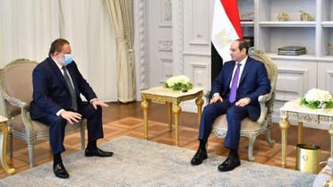 Egyptian President Abdel Fattah al-Sisi meeting with Hassan Abdullah, caretaker governor of the central bank. (Twitter)