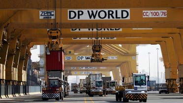 Terminal tractors line up to load containers into a cargo ship at DP World's fully automated Terminal 2 at Jebel Ali Port in Dubai, UAE. (Reuters)