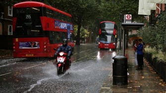 Downpour brings flash floods to London streets, after weeks of dry, hot weather