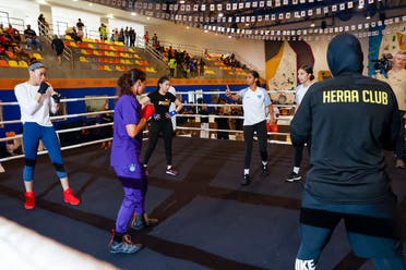 Saudi girls and women participate in a boxing training session. (Supplied)