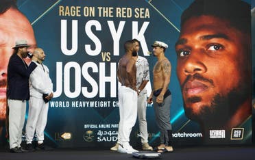 Badou Jack (left) faces off against Richard Rivera (right) at Jeddah's King Abdullah Sports City on August 19, 2022, ahead of their bout on August 20. 