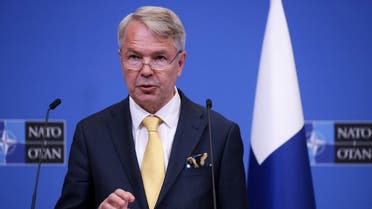 Finnish Foreign Minister Pekka Haavisto gives a press conference after the signing of the accession protocols of Finland and Sweden at the NATO headquarters in Brussels on July 5, 2022. (AFP)