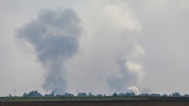 A view shows smoke rising above the area following an alleged explosion in the village of Mayskoye in the Dzhankoi district, Crimea, August 16, 2022. (Reuters)