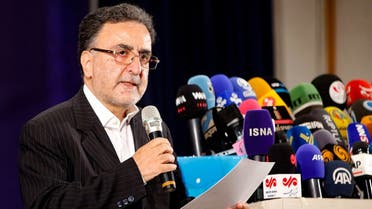 In this file photo taken on May 14, 2021 Iranian reformist politician Mostafa Tajzadeh speaks to the media after registering his candidacy at the Interior Ministry in the capital Tehran. (AFP)