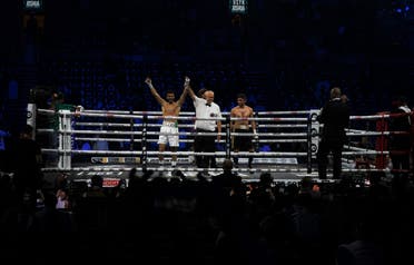 Ziyad al-Maayouf has his hands raised after knocking out Alfredo Alatorre, becoming the first Saudi to win a professional boxing match during the Rage on the Red Sea event in Jeddah on August 20, 2022.