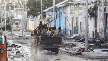 Somali security officers drive past a section of Hotel Hayat, the scene of an al Qaeda-linked al Shabaab group militant attack in Mogadishu, Somalia August 20, 2022. (Reuters)