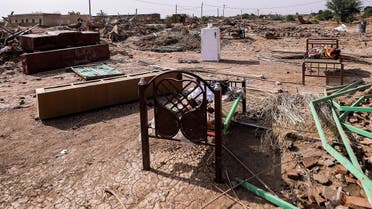 Salvaged furniture is taken outside destroyed homes following floods in the village of Makaylab in Sudan's Nile River State, August 18, 2022. (AFP)