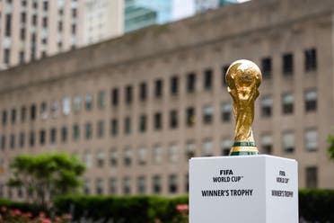 Jun 16, 2022; New York, New York, USA; The FIFA World Cup Trophy sits on a stand outside of 30 Rockefeller Plaza. (Reuters)