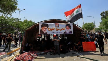 Supporters of Iraqi cleric Muqtada al-Sadr gather for a sit-in in front of the gate of Supreme Judicial Council of Iraq, amid political crisis in Baghdad, Iraq, on August 23, 2022. (Reuters)