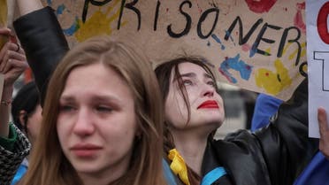 Women cry as they take part in a rally demanding international leaders to organise a humanitarian corridor for the evacuation of Ukrainian military and civilians from Mariupol, amid Russia's invasion of Ukraine, in central Kyiv, Ukraine April 30, 2022. (Reuters)