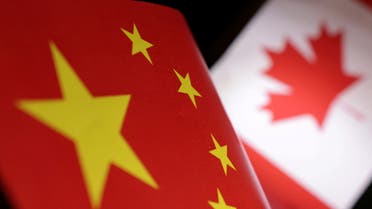 Printed Chinese and Canada flags are seen in this illustration, July 21, 2022. (Reuters)