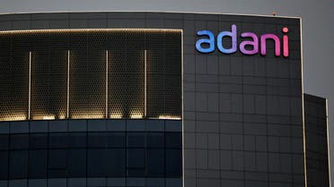 The logo of the Adani Group is seen on the facade of one of its buildings on the outskirts of Ahmedabad, India. (Reuters)