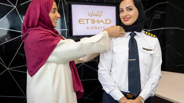 Etihad pilot Aisha al-Mansoori has made UAE aviation history after earning her stripes as the country’s first female commercial pilot. (Supplied)
