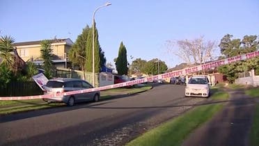 A view of a police cordon at the scene where suitcases with the remains of two children were found, after a family, who are not connected to the deaths, bought them at an online auction for an unclaimed locker, in Auckland, New Zealand, on August 11, 2022 in this still image taken from video. (Reuters)