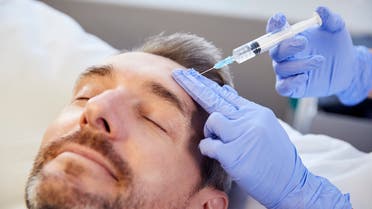 Stock image of a man receiving Botox in his forehead. (Twitter)