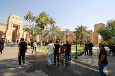 Supporters of Iraqi Shia cleric Moqtada Sadr enter the Republican Palace in the capital Baghdad's Green Zone, on August 29, 2022. (AFP)