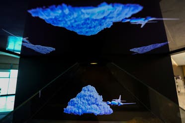 An explanatory hologram of the cloud seeding process is seen inside the control room at the National Center of Meteorology in Abu Dhabi, UAE, on August 24, 2022. (Reuters)