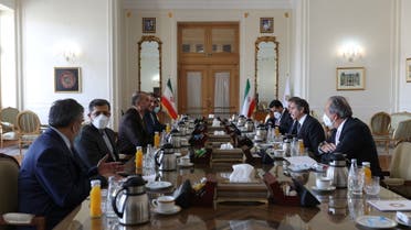 IAEA Director General Rafael Mariano Grossi meets with Iran's Foreign Minister Hossein Amir-Abdollahian in Tehran, Iran, March 5, 2022. (Reuters)