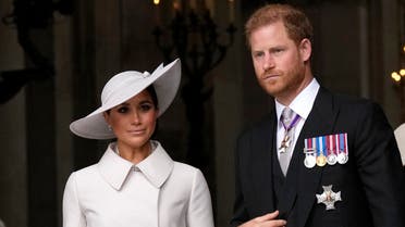 FILE - Prince Harry and Meghan Markle, Duke and Duchess of Sussex leave after a service of thanksgiving for the reign of Queen Elizabeth II at St Paul's Cathedral in London, on June 3, 2022. Meghan has said that “just by existing,” she and her husband Prince Harry had “upset the dynamic of the hierarchy when they were in the U.K. (AP Photo/Matt Dunham, Pool)