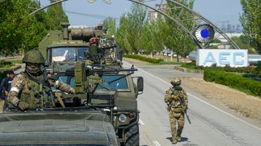 FILE - A Russian military convoy is seen on the road toward the Zaporizhzhia Nuclear Power Station, in Enerhodar, Zaporizhzhia region, in territory under Russian military control, southeastern Ukraine, on May 1, 2022. Inspectors from the International Atomic Energy Agency visited the sprawling plant in southern Ukraine on Thursday, Sept. 1, 2022 The IAEA’s Director General Rafael Mariano Grossi highlighted the risks they had to deploy a team in the area amidst the war. (AP Photo, File)