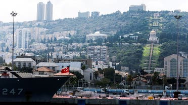A Turkish naval frigate is seen berthed at the Haifa Port, with the Baha'i Gardens in the background, in Haifa, Israel September 4, 2022. (Reuters)