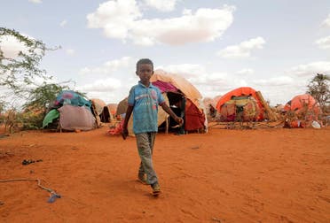 Abdulahi Hassan, 3, walks at the Kaxareey camp for the internally displaced people in Dollow, Gedo region of Somalia, on May 24, 2022. (Reuters)