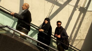 Iranians exit the subway after arriving to downtown Tehran on February 24, 2016. (AFP)
