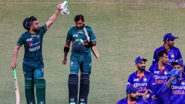 Pakistan’s Khushdil Shah (L) celebrates with teammate Iftikhar Ahmed after their win at the end of the Asia Cup Twenty20 international cricket Super Four match between India and Pakistan at the Dubai International Cricket Stadium in Dubai on September 4, 2022. (AFP)