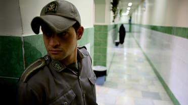 A prison guard stands along a corridor in Tehran's Evin prison June 13, 2006. Iranian police detained 70 people at a demonstration in favour of women's rights, the judiciary said on Tuesday, adding it was ready to review reports that the police had beaten some demonstrators. (Reuters)