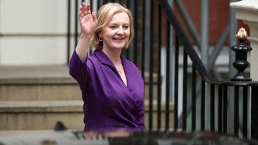 Liz Truss gestures outside the Conservative Party headquarters, after being announced as Britain’s next Prime Minister, in London, Britain, on September 5, 2022. (Reuters)