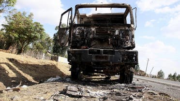 A file photo shows a wreckage of a truck torched during recent demonstrations is seen along the road in Holonkomi town, in Oromiya region of Ethiopia. (Reuters)