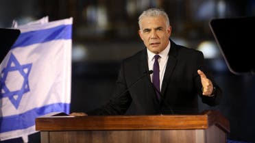 Israeli Prime Minister Yair Lapid delivers a speech during a graduation ceremony of Israel Navy Officers, in the northern city of Haifa, on September 7, 2022. (AFP)