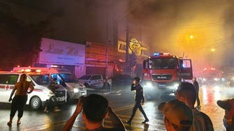 Vietnam karaoke bar owner arrested after blaze that left 32 dead